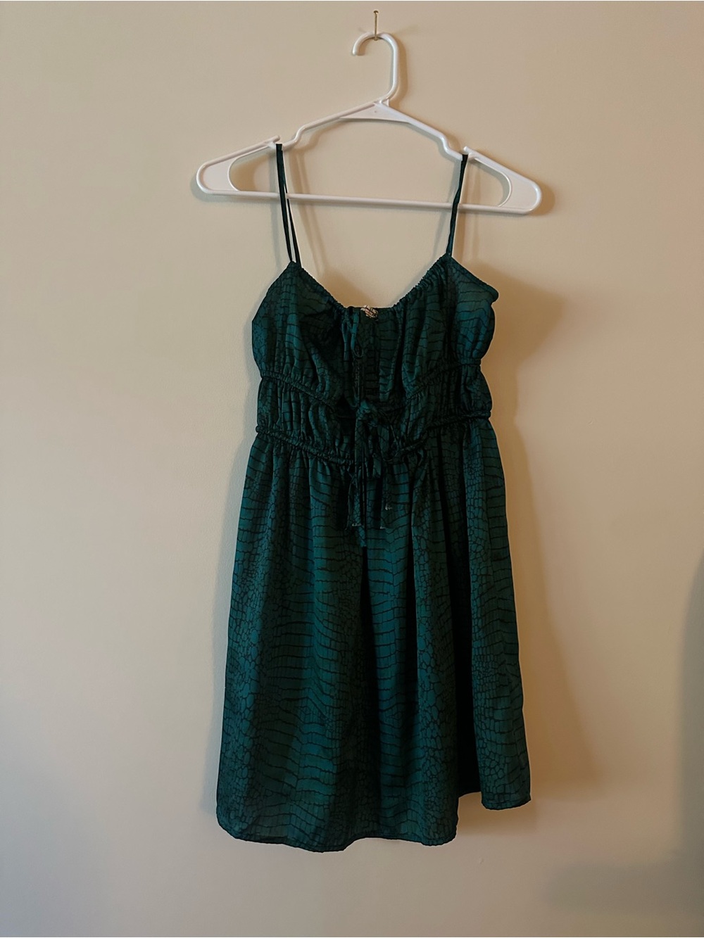 Free People’s Dark Green Printed Spaghetti-Strap Mini Dress